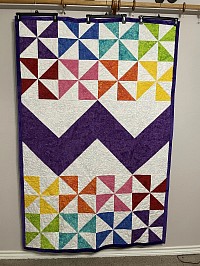 Purple pinwheel & chevron quilt